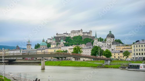 The city of Salzburg with the Salzach River and the Fortess Hochenzalzburg, Austria - Timelapse Video