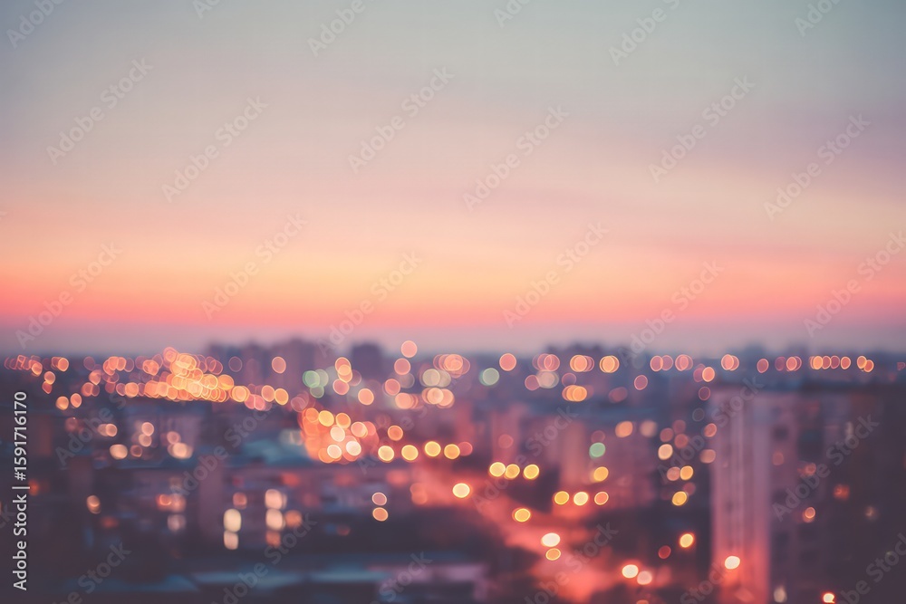 Fototapeta premium Blurred Cityscape At Sunset