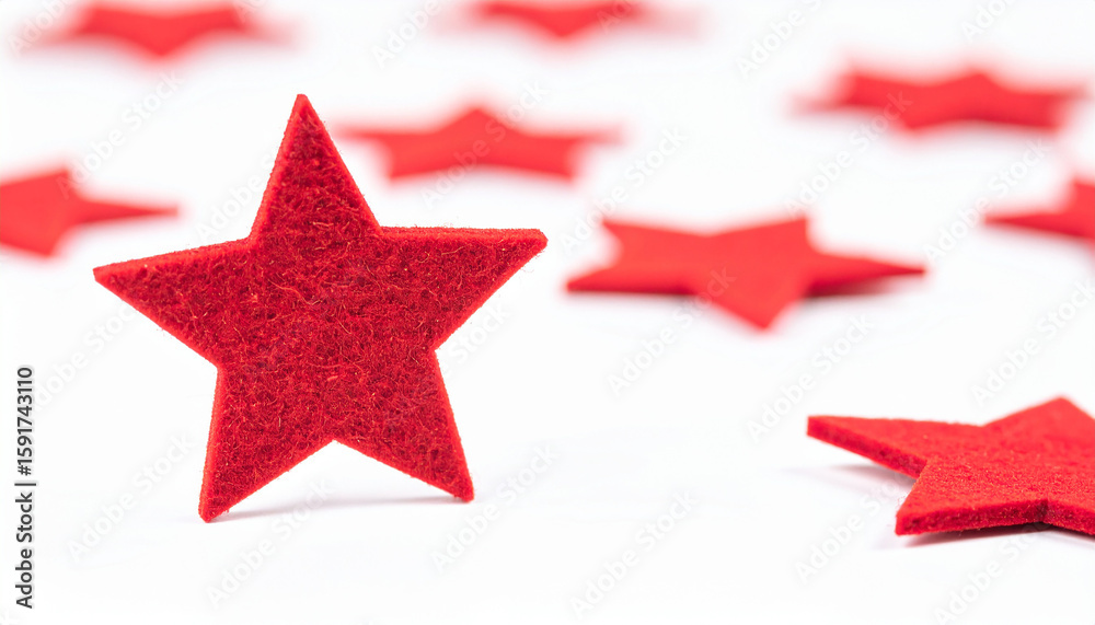 Obraz premium Red felt star shape isolated on white backdrop.