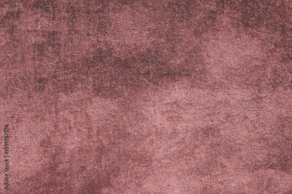 Fototapeta premium Detailed view of a dusty rose fabric showcasing texture and subtle color variations.