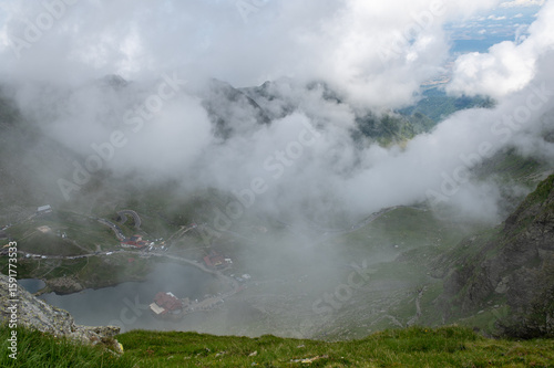 Mountain peaks covered with mist and clouds in the Făgăraș Mountains. Transfagarasan, Romania.