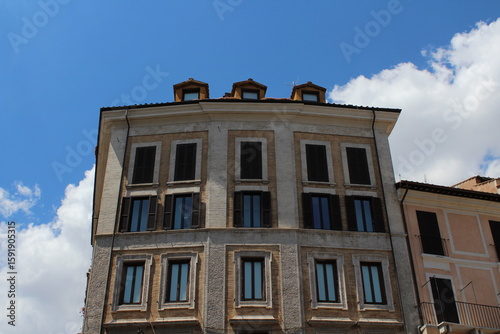 Fototapeta Naklejka Na Ścianę i Meble -  Cozy old street in Trastevere in Rome, Italy. Trastevere is rione of Rome, on the west bank of the Tiber in Rome, Lazio, Italy. Architecture and landmark of Rome Traditional ¨Rome buildings and houses