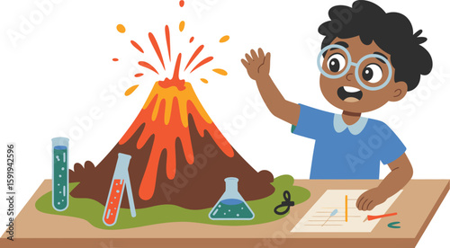 Boy with Glasses Observing Volcano Science Experiment on Tabletop