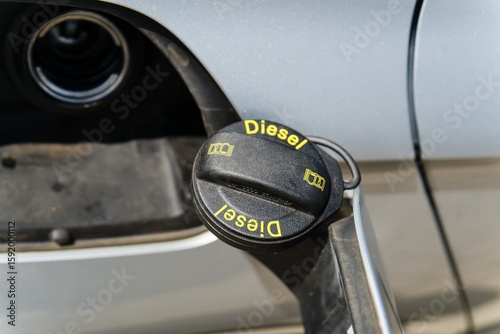 Fuel Cap with Diesel Label on Silver Car