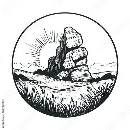 Serene landscape with sun rising behind rocky formation at dawn