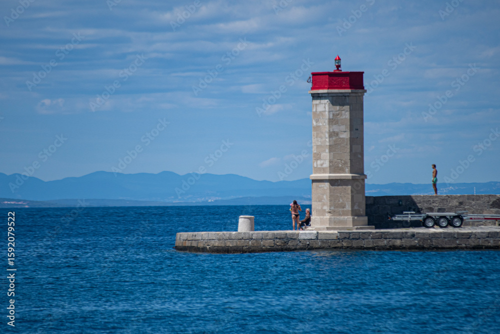 lighthouse on the coast of the sea lighthouse on the coast of the sea