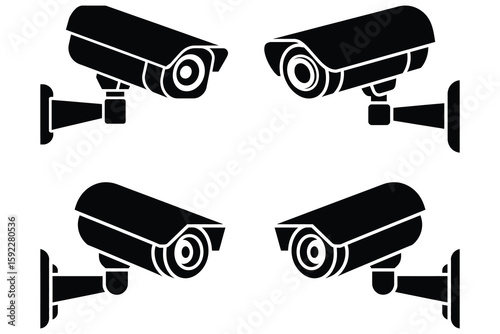 Black security cameras mounted on walls surveillance