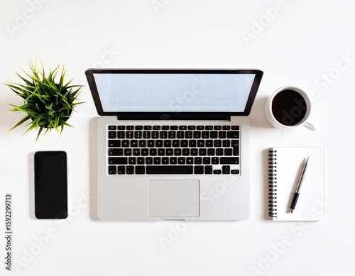 Flat Lay Workspace with Laptop, Smartphone, Coffee Mug, Notepad, and Plant on White Desk