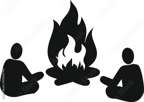 silhouette of a man sitting on a fire