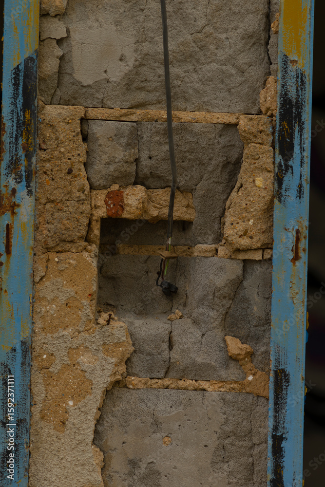 This is a detailed closeup view of a brick wall, which interestingly features a notable hole that is visible within the bricks This is a detailed closeup view of a brick wall, which interestingly features a notable hole that is visible within the bricks