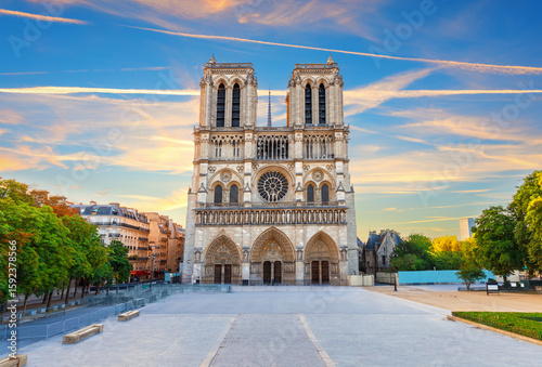 Front view of Notre-Dame, famous place of visit of Paris, sunrise photo