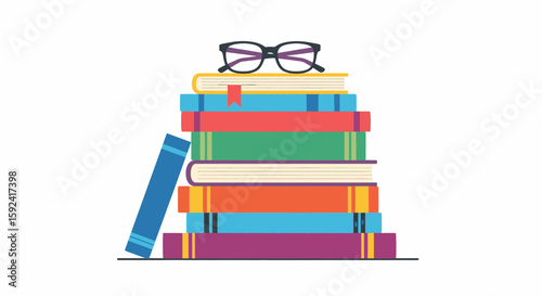 A colorful stack of books with eyeglasses resting on top, isolated.