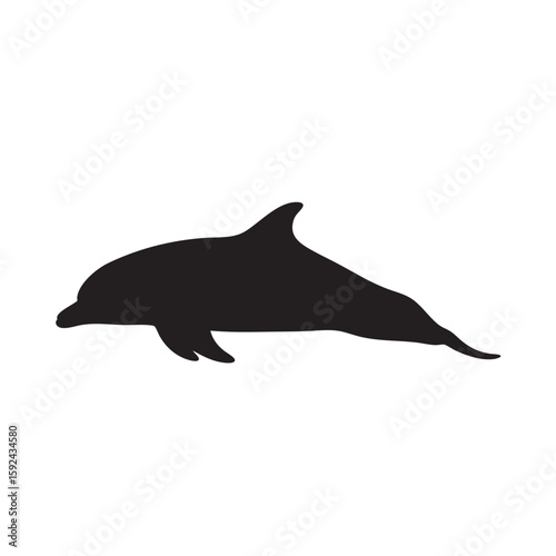 Silhouette of a graceful dolphin gliding through the ocean waters with ease