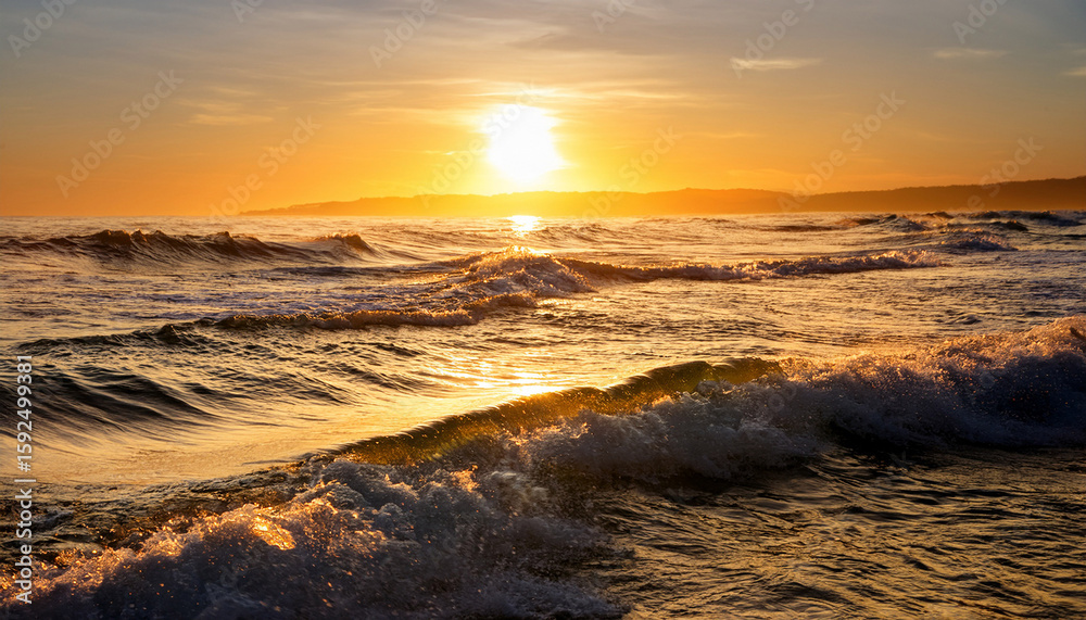 Obraz premium serene ocean waves at sunset with golden reflections