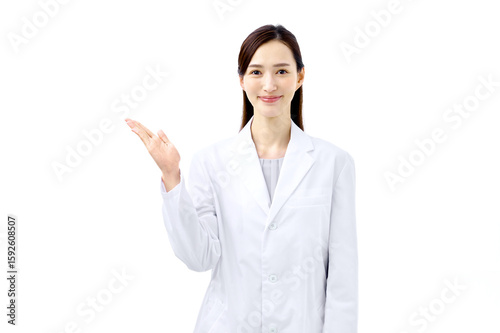 説明する医師　白衣の女性　医療従事者