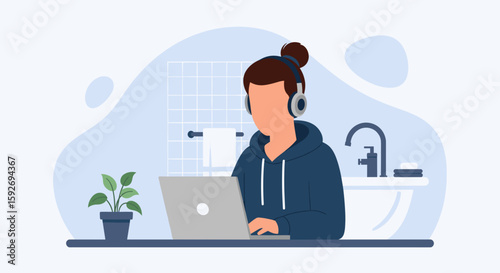 Person working on laptop in bathroom, perfect for articles about remote work, work-life balance, or flexible work arrangements.