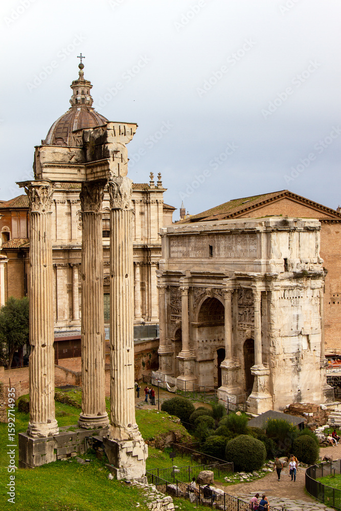 Obraz premium Picture of the Temple of Castor and Pollux and the Temple of Concord in the famous Roman Forum. The Palatine Hill, Rome, Italy.
