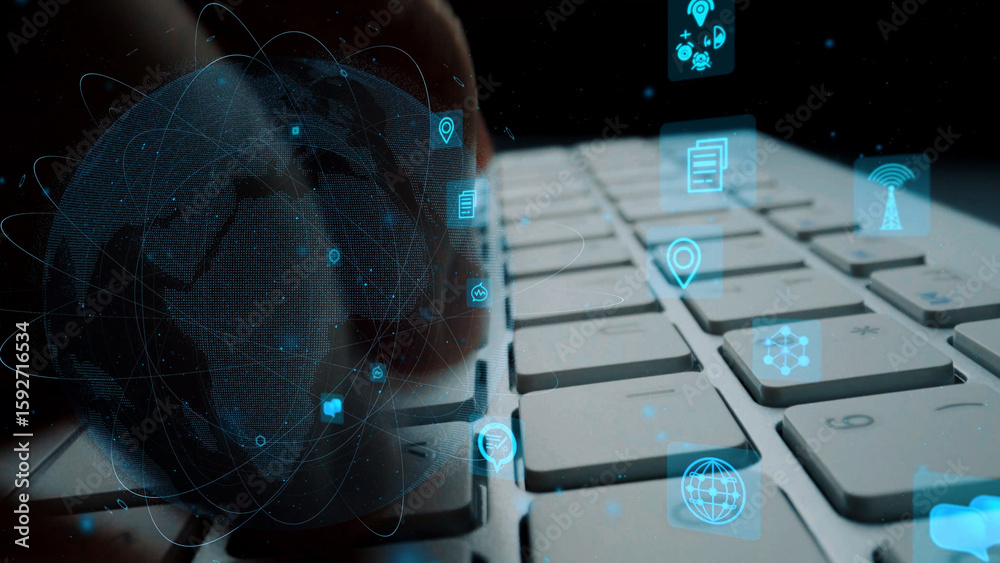 Obraz premium A close-up view of hands typing on a keyboard with floating digital icons and a globe overlay, illustrating the concept of global connectivity and modern technology. Xenic