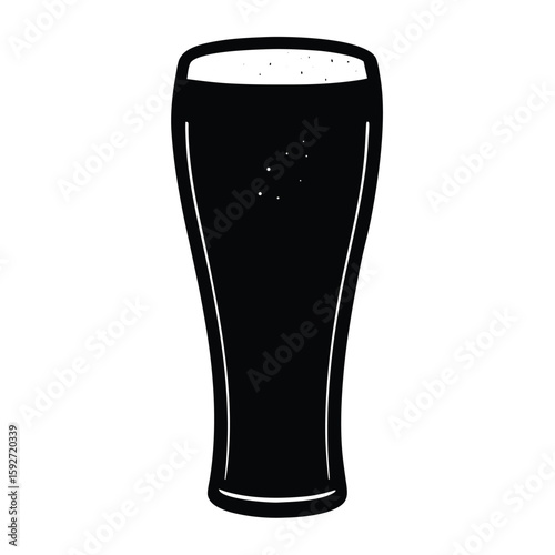 Black pint glass with frothy beverage beer dark beverage