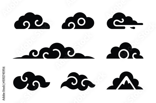Black cloud silhouettes with decorative swirls and mountain peaks white