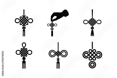 Black Chinese knot ornaments and a hand silhouette tassel
