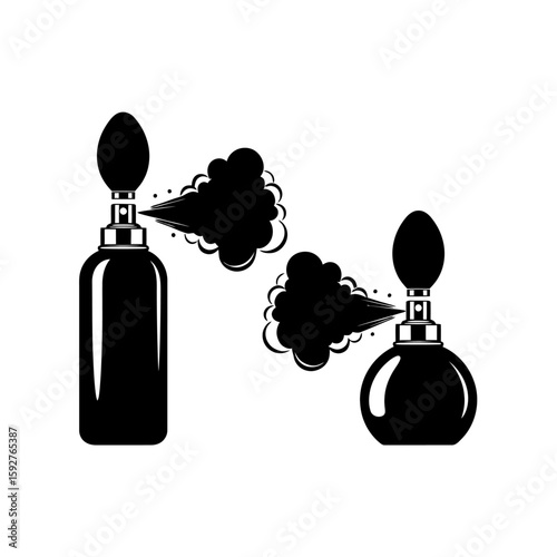 Two black perfume bottles spraying fragrance on a white isolated background