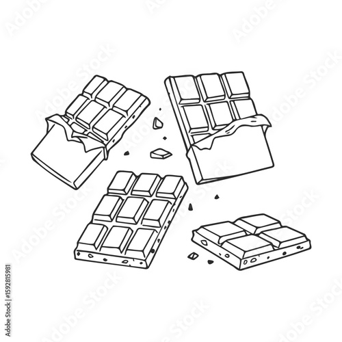 Black and white chocolate bars: four broken pieces with crumbs