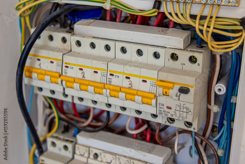 Electrical panel with circuit breakers and wiring. Soft focus. Residual current devices