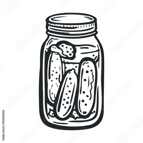 Pickling cucumbers in a glass jar for homemade preserves