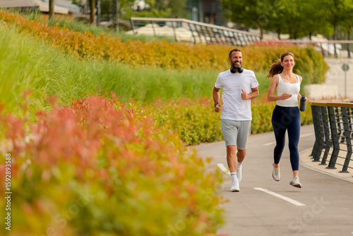 Couple jogging together in ...