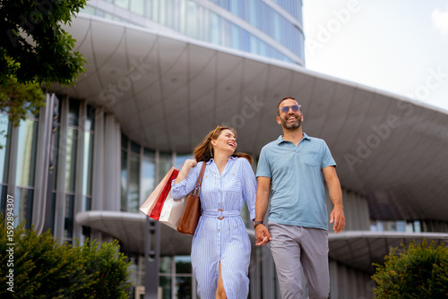 Happy couple exploring a mo...