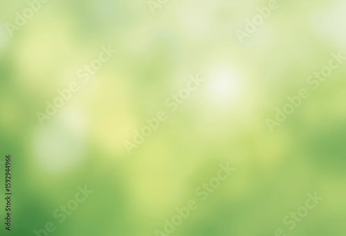 Soft abstract background with gentle green hues and blurred bokeh effect creating a tranquil atmosphere