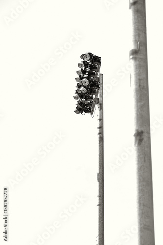 Bank of Stadium Flood Lights Mounted to a Large Pole
