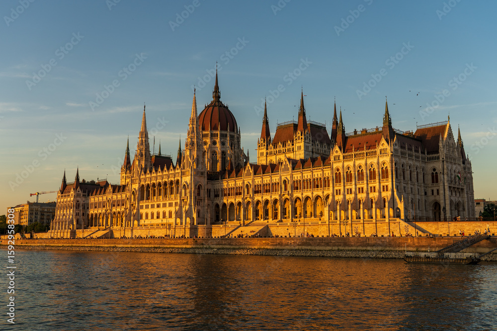 Fototapeta premium Budapest, Hungary - July 7, 2025: View of the city landmarks. Hungarian Parliament Building.
