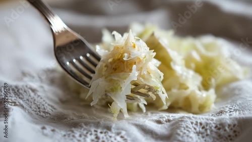cheese, lettuce vegetable, cabbage, sauerkraut on fork