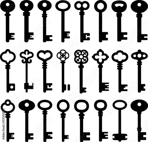 Collection of black vintage and ornate keys on white background antique
