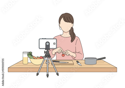 Woman sharing a cooking tutorial video with tomato prep on her streaming phone with clean bright