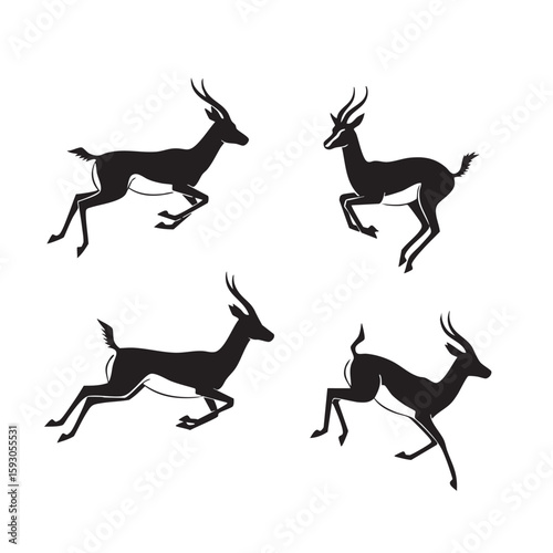Four black antelopes running across white jumping leaping