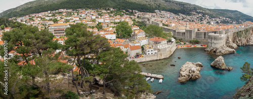 panoramic of Dubrovnik West Harbour, in Croatia. Castle walls and bastion on background