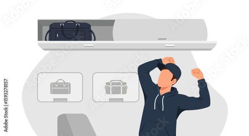 Passenger Prepares To Stow Luggage Overhead On Commercial Airline Flight