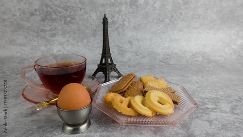 Enjoying Tea with Cookies and Egg Still Life Arrangement