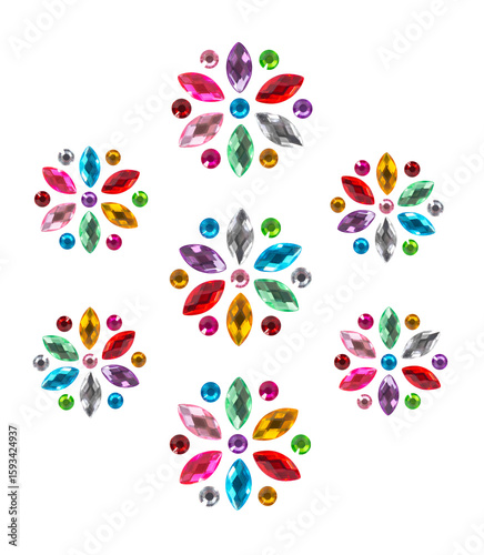 Decorative crystal rhinestone flowers. Isolated multicolored сrystal decals in the shape of flowers, decorative stickers for manicure, handcrafting or patchwork.