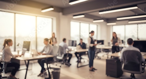 Modern business office interior with employees working. Blurred background for professional concepts and presentations.
