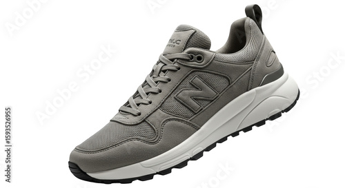 Stylish grey suede New Balance sneakers, angled view showcasing comfort and design.