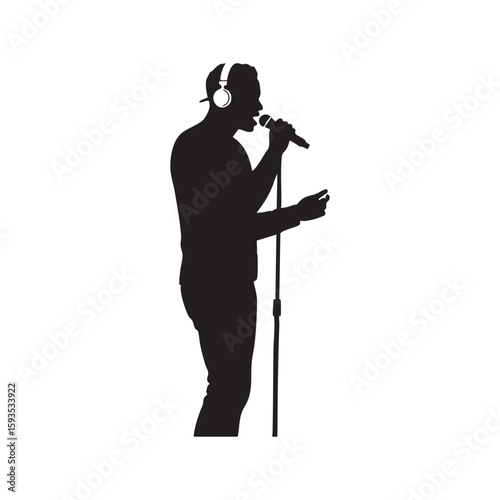 Man wearing headphones singing into microphone silhouette isolated on white background