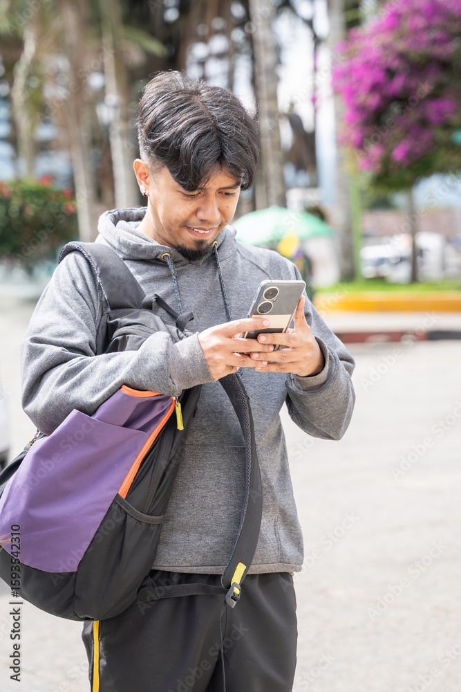 Fototapeta premium closeup of traveler looking his cell phone