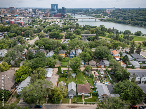 Fototapeta Naklejka Na Ścianę i Meble -  City view from above with a river running through it