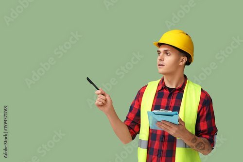 Young male engineer with cl...