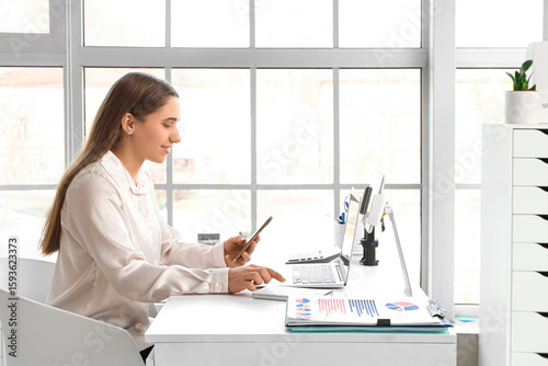 Female accountant working w...
