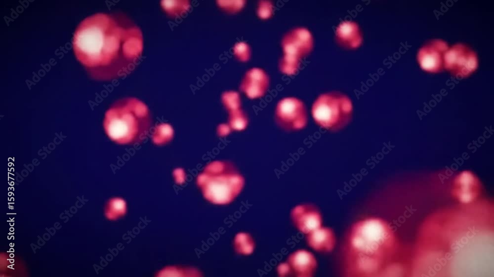 Abstract background with red bokeh light bubbles rising smoothly from bottom to top. Soft glowing orbs with a dynamic, flowing motion, creating a vibrant and energetic atmosphere.